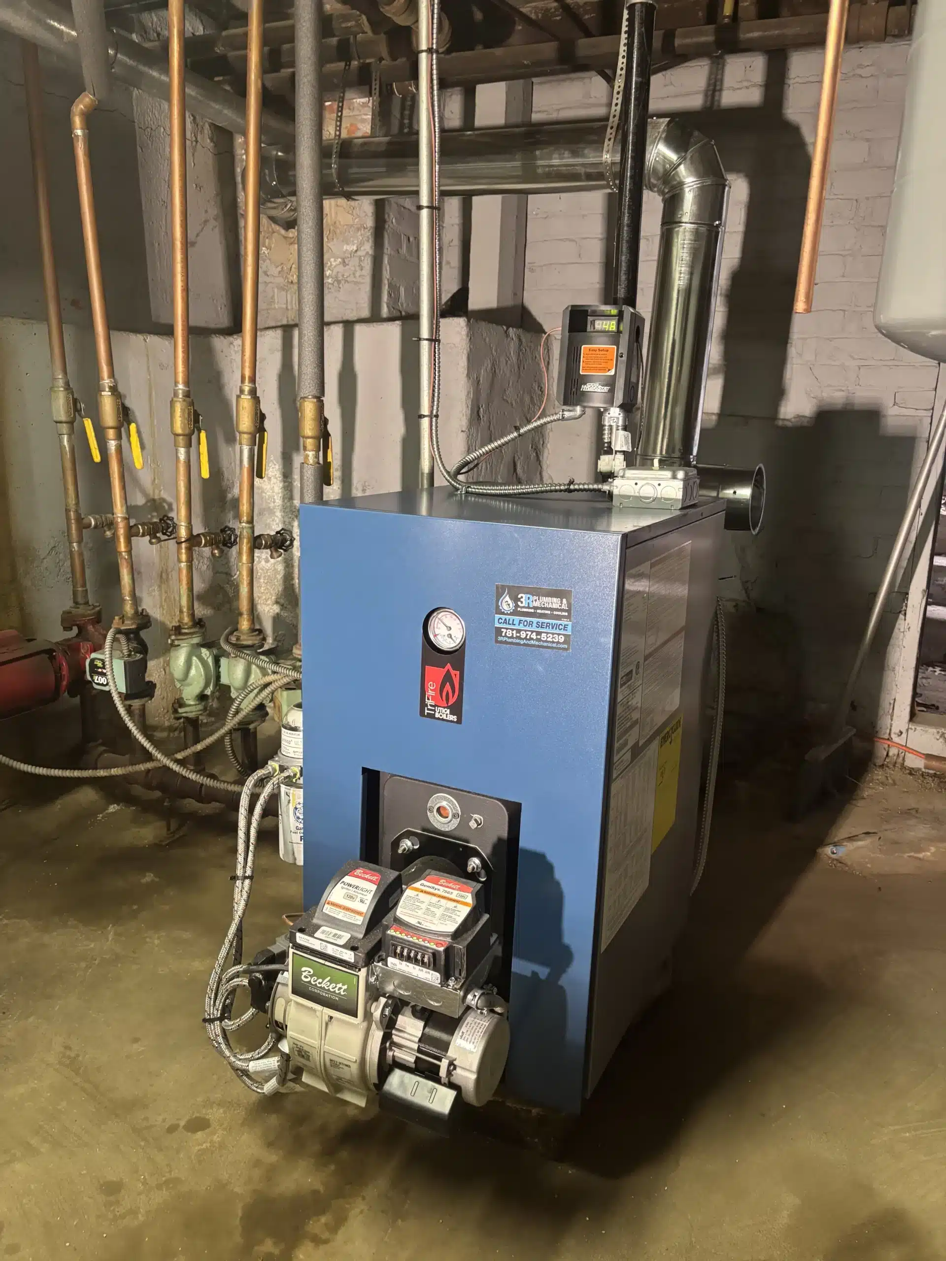 Clean oil-fired boiler install with Beckett burner and copper piping by 3R Plumbing & Mechanical, South Shore MA